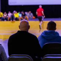 People watching a basketball game